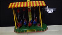 Mechanical wind up canoe toy