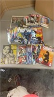 Variety of Superhero magazines and books