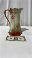 Porcelain hand painted pitcher