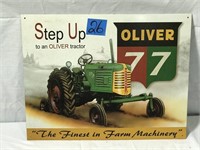 Oliver "77 Step up to an Oliver Tractor” Tin Ad
