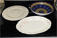 Serving platters and large serving bowl.