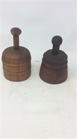 Two round butter molds