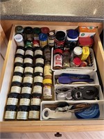 Full drawer - all spices & utensils