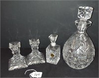 CRYSTAL DECANTERS AND CANDLE HOLDERS