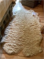 New Zealand sheepskin rug appr 48" x 74"