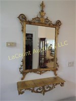 ornate gold framed mirror and shelf beautiful