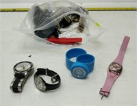 lot of watches, watch bands, etc.