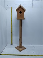 wooden birdhouse on stand, approx 35" tall