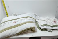 queen-size quilt with bed skirt