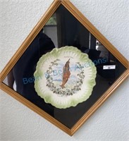 Round oak souvenir plate in frame