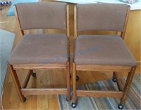 Two barstools on wheels