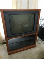 Rca TV in wood cabinet