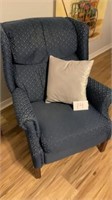 Blue chair with pillow