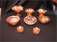 Eight pieces of vintage marigold carnival glass: