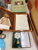 Bibles and Jesus sign