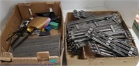 (AB) Boxes of model rail road train tracks and