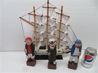 Sail boat with folk art carved sailers15"L  15"T