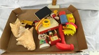 (2) sea shells, assorted toys