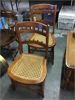2 woven cane bottom chairs