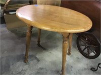Oval maple table 28x24 tall
