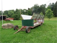 CATTLE FEEDER WAGON, HAS EXTRA TIRES TO REPLACE