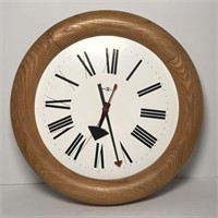 Howard Miller Oak Framed Wall Clock