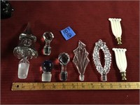 8 glass stoppers and finials
