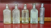 Good lot of five Antique medicine bottles.