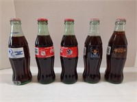 Various Coca-Cola Classic Collectors Bottles