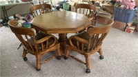 Oak Kitchen Table with 4 Roll Around Chairs