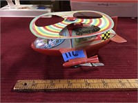 Metal and plastic windup spaceship toy #917