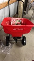 65lb broadcast spreader by earth way with