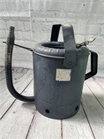 Vintage embossed oil can