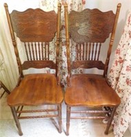 Pair of oak pressed back chairs