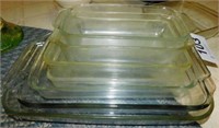 8 glass baking dishes, all different sizes