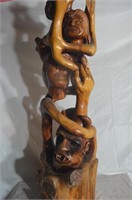 WOOD CARVING OF REACHING FOR SOULS