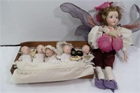 Porcelain Dolls & 5 Babies in a Bed