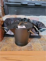 Coal bucket with fireplace accessories