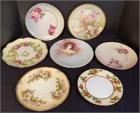Stack of Eight Porcelain Plates Floral