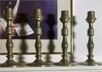 Four Heavy Early Brass Candlesticks