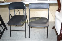 Two Black Folding Chairs