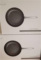 2 New skillets.  Sealed boxes