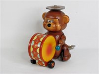 Vintage Wind Up Rolling Bear Musician Toy