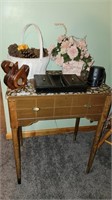Empty sewing machine cabinet & decor