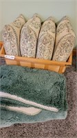 Basket of throw pillows & Bathroom rugs