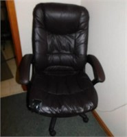 Black adjustable rolling office chair