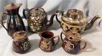 2 English brown enameled teapots, one has