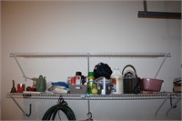 shelf of garage items, bug sprays , duck tape ,