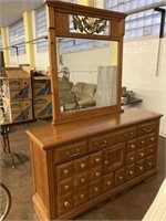 Dresser with decorative mirror