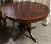 Round Pedestal Table with Metal Tipped Feet